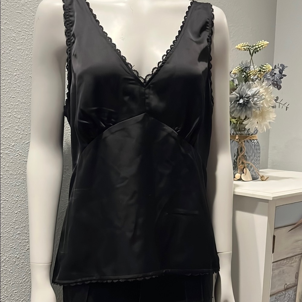 Elegant Black lace trim tank sexy fun ! Great to work by itself with the blazer